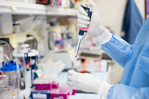 Scientist conducting experiments in lab showing lab equipment for RAD-140 latest research 2025 study